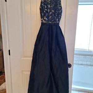 ML DTESS SIZE 6, BLACK WITH SEQUENSE AND POOFY SKIRT